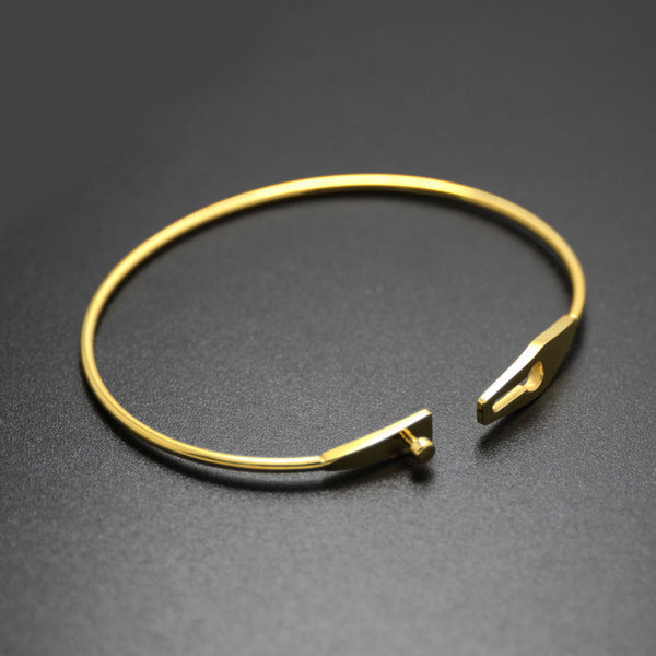 Darius Brasky Jeweller - Custom order: Gold locking cuff bracelet with  vintage diamond and gold bracelet set in the centre Each year of marriage  brought a new piece of jewellery and our